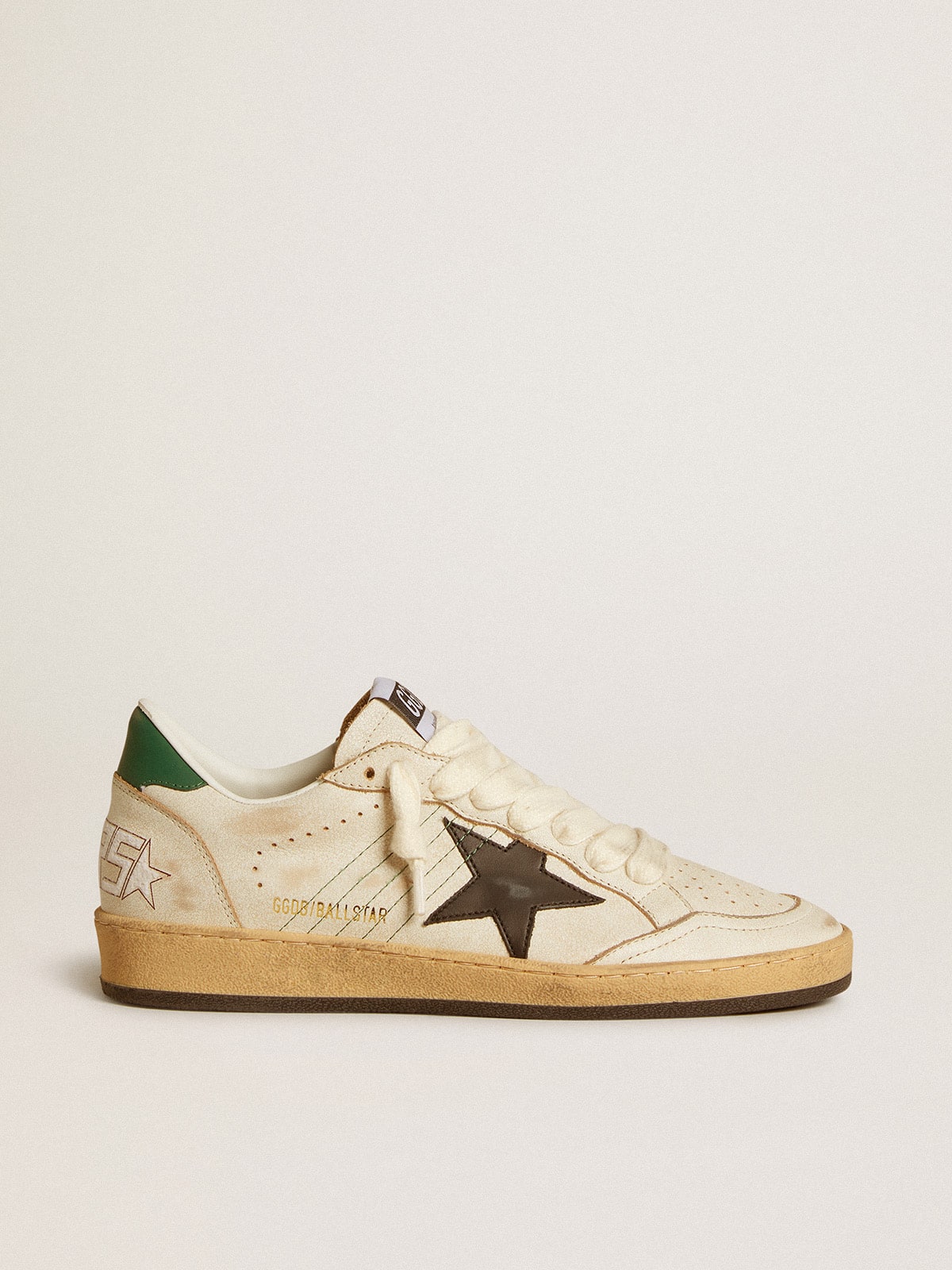 Black leather star and green leather on the heel