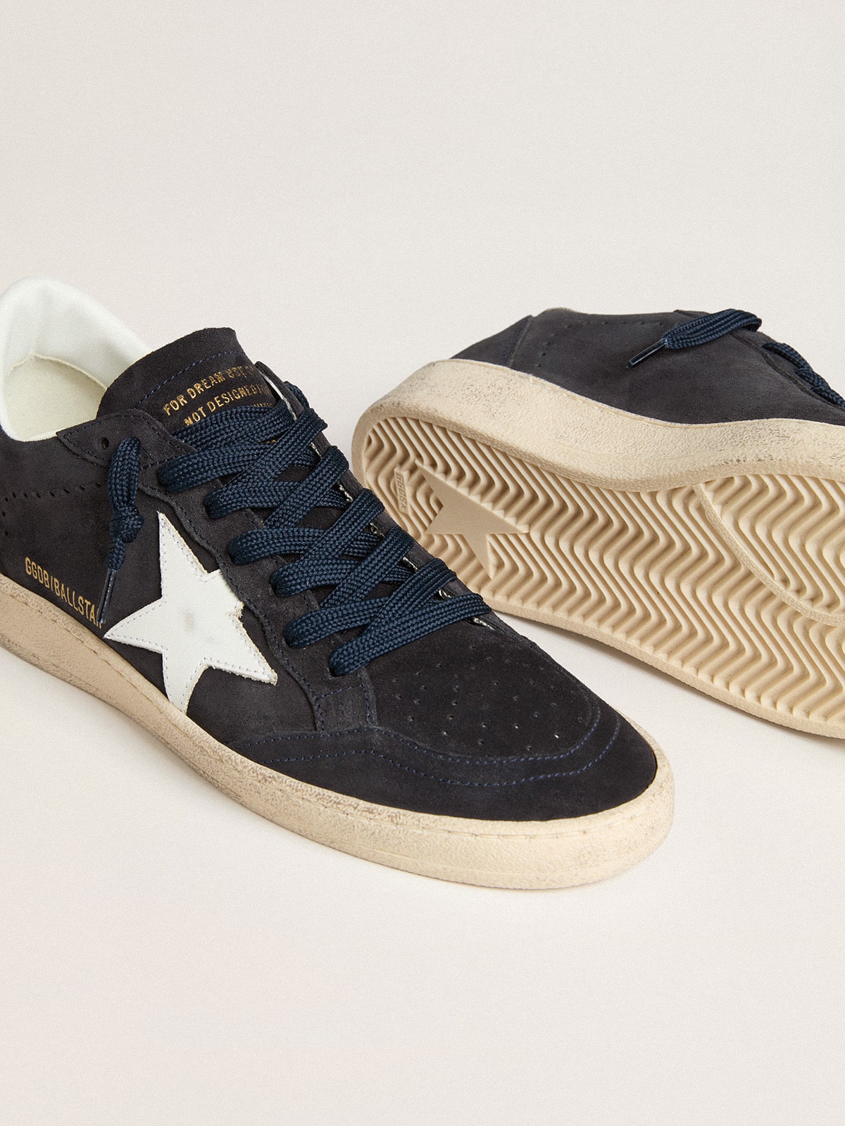 Dark blue suede with star and leather heel detail