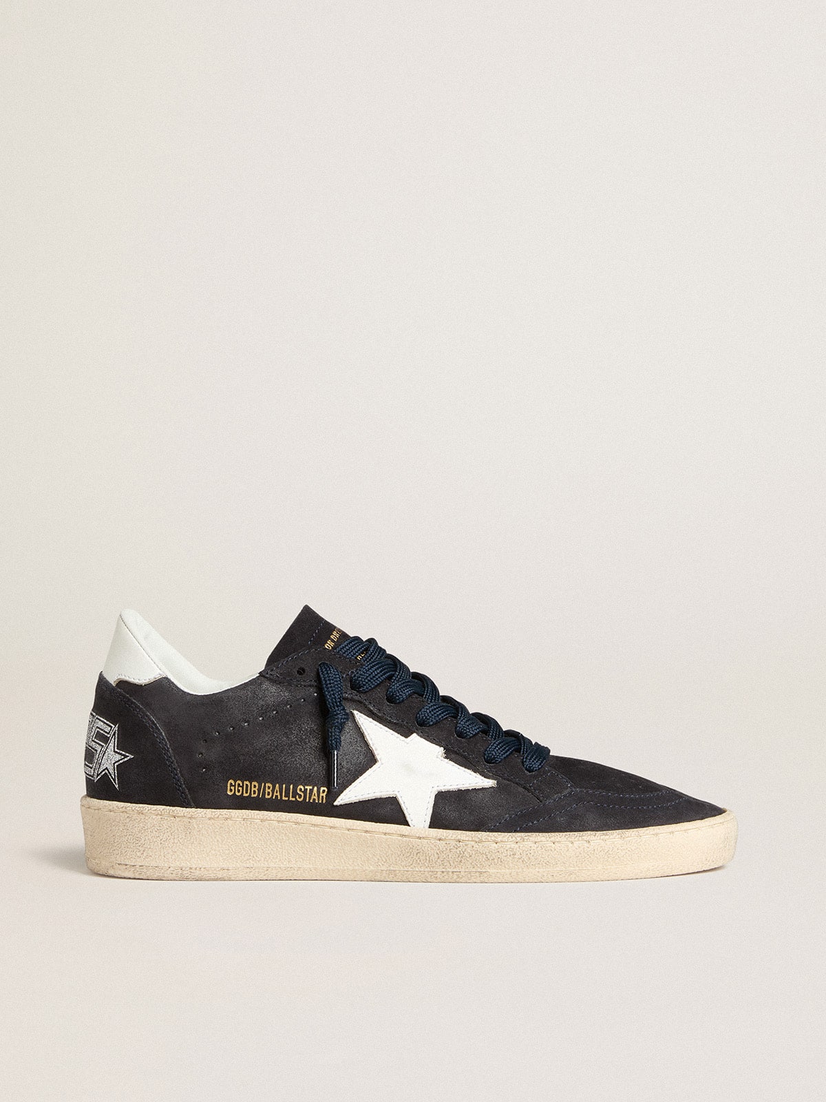 Dark blue suede with star and leather heel detail