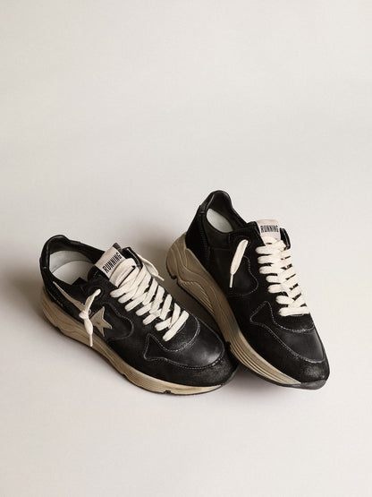 Running sole made of black nappa and suede