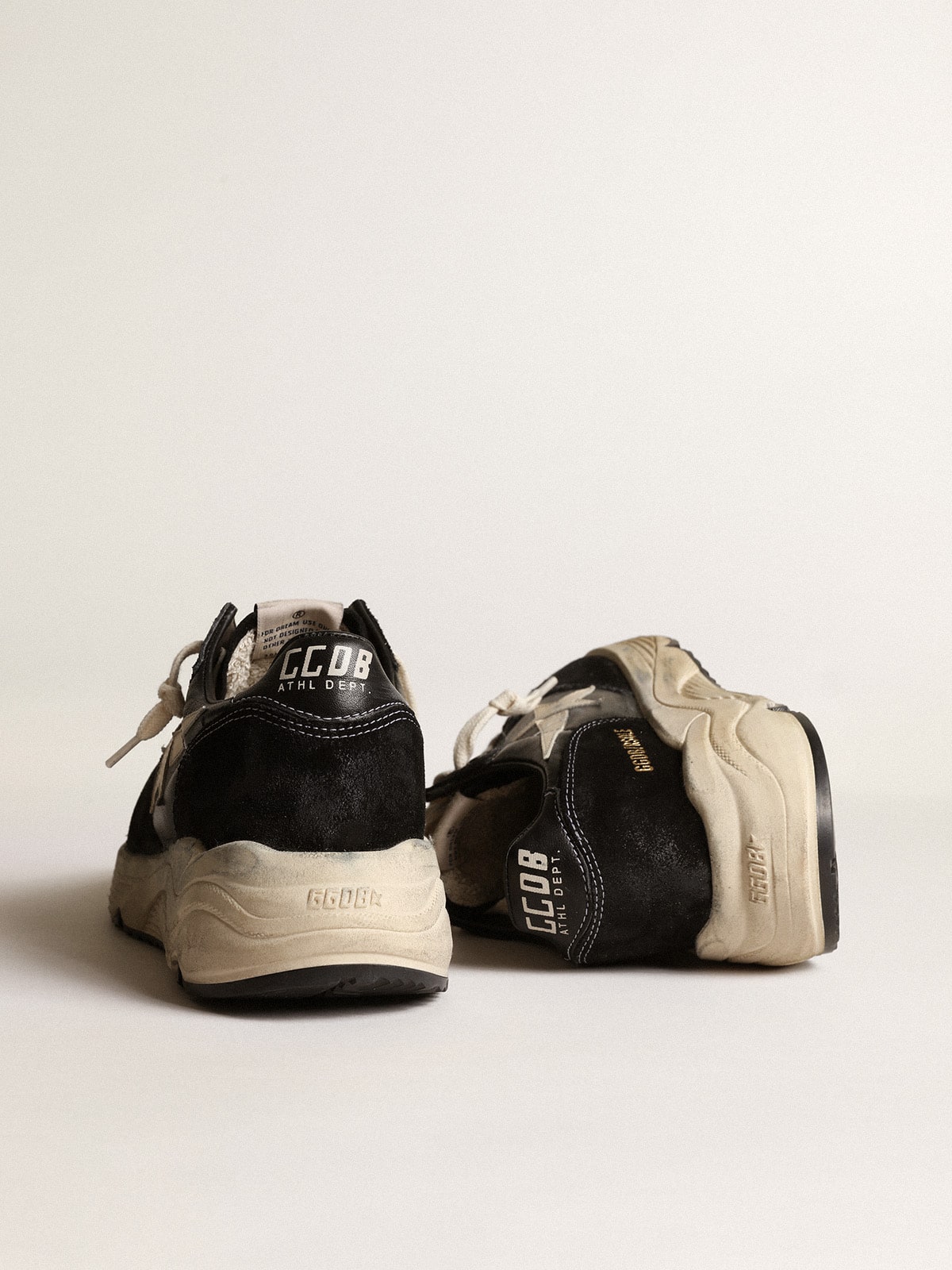 Running sole made of black nappa and suede