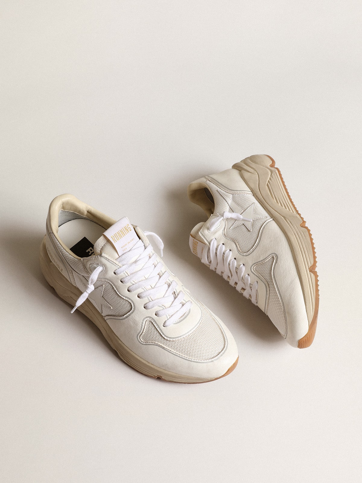 Running sole made of mesh and white nappa leather