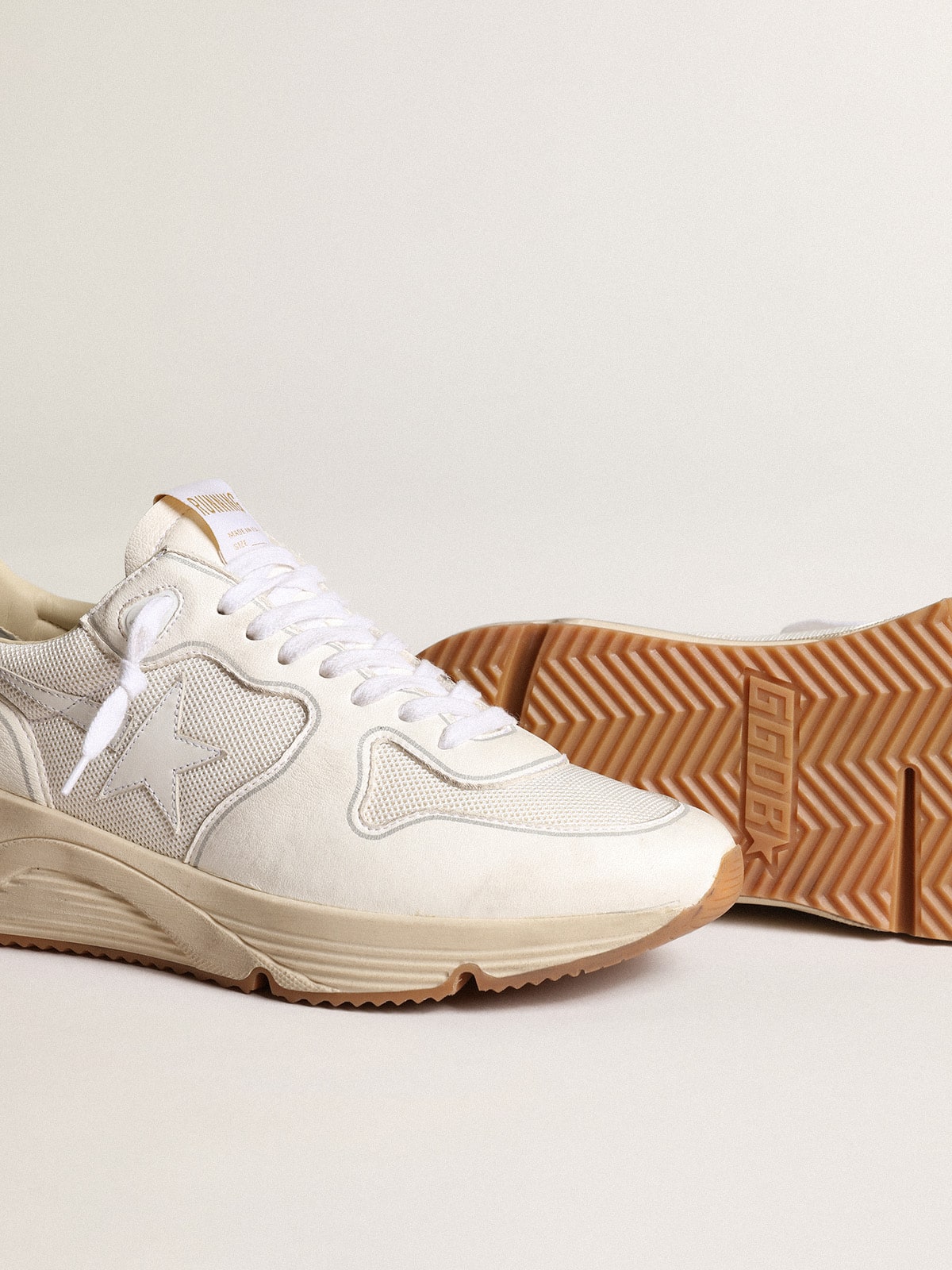 Running sole made of mesh and white nappa leather