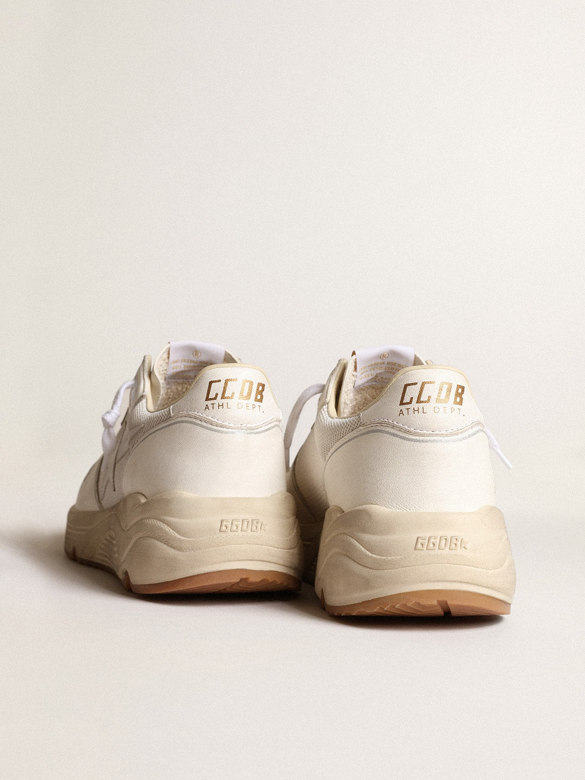 Running sole made of mesh and white nappa leather