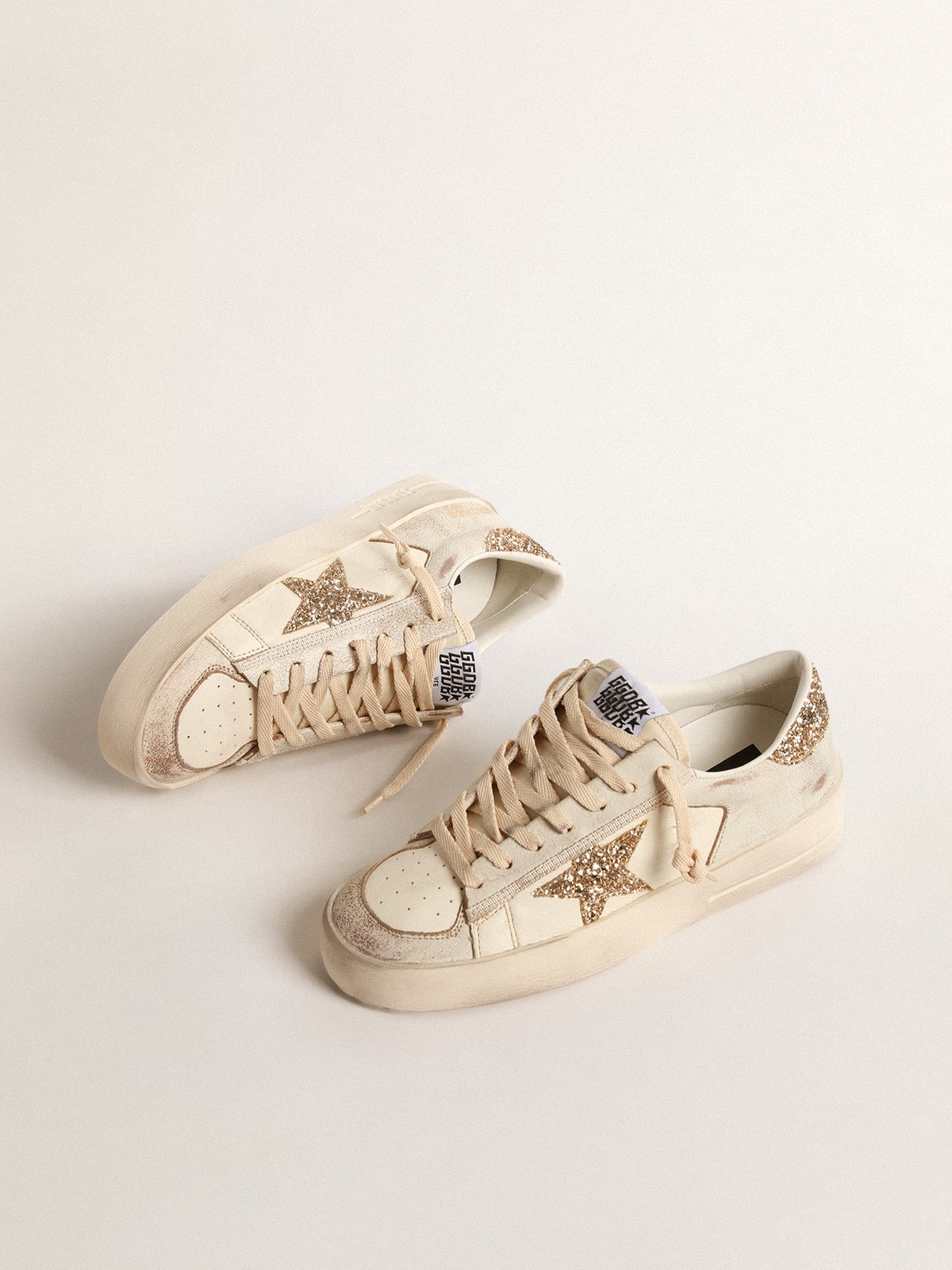 Stardan in ecru nappa leather with gold glitter star and heel