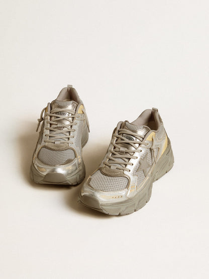 Silver-colored Lightstar made of metallic leather and mesh with a gray star