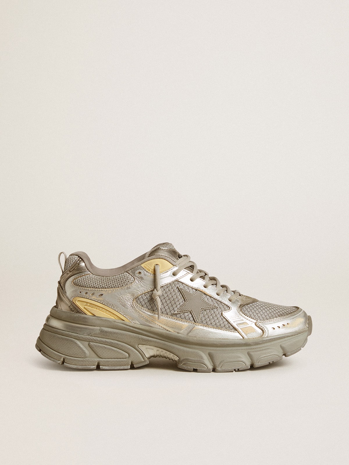 Silver-colored Lightstar made of metallic leather and mesh with a gray star
