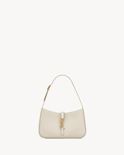 Le 5 À 7 made of smooth leather in white