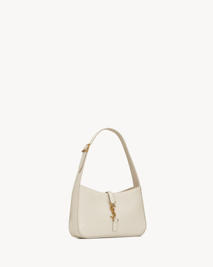 Le 5 À 7 made of smooth leather in white