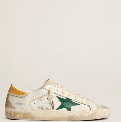 Super-Star with green suede star and yellow heel in crocodile look