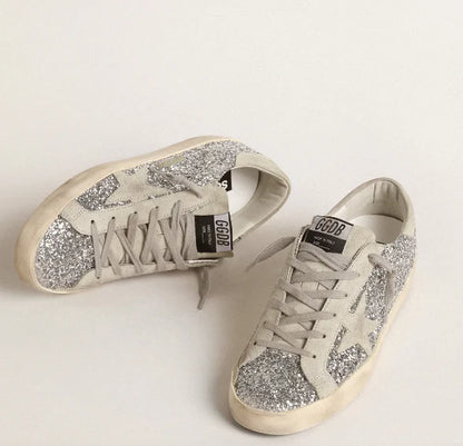 Super-Star made of silver glitter with ice-grey suede star